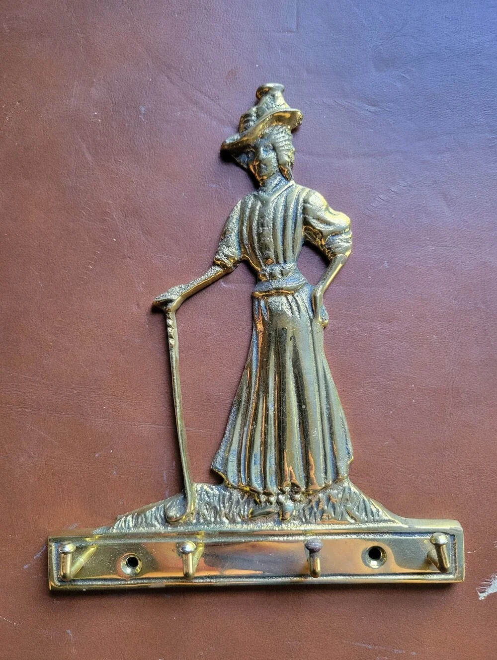 brass key rack holder golf Victorian woman female golfer